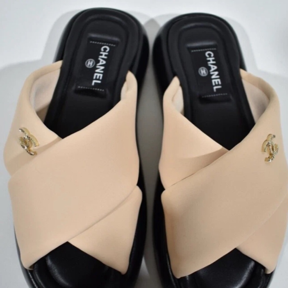 CHANEL Cream and Black Mules with Elegant Design